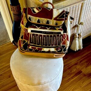 I have here multi colored back sack with handles and straps